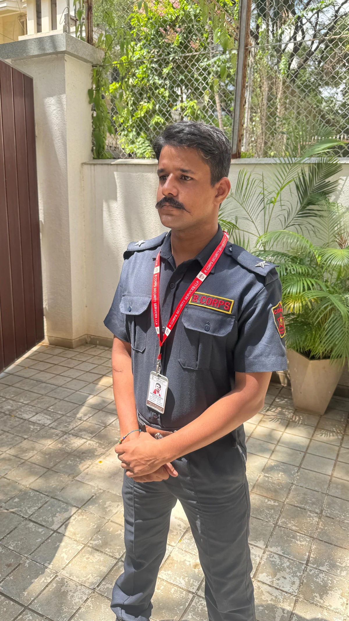 R CORPS guard in the company uniform at an entrance